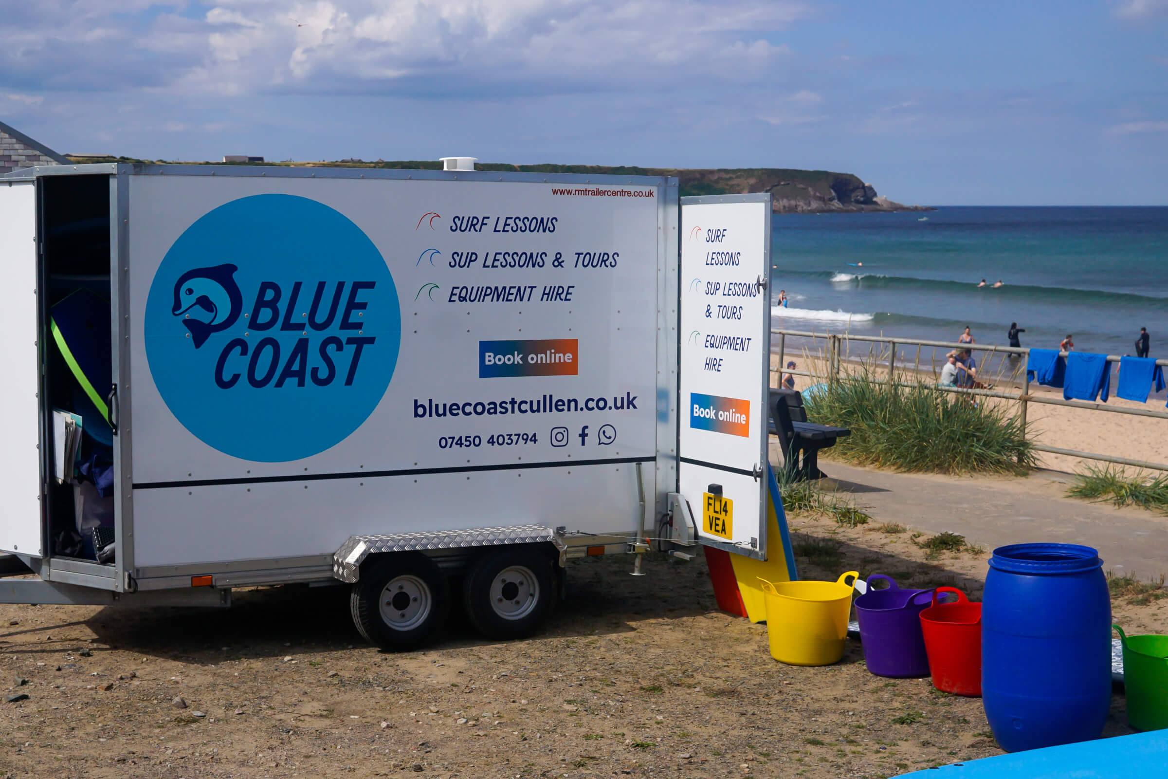 Surf hire trailer right in front of the waves at Cullen Beach